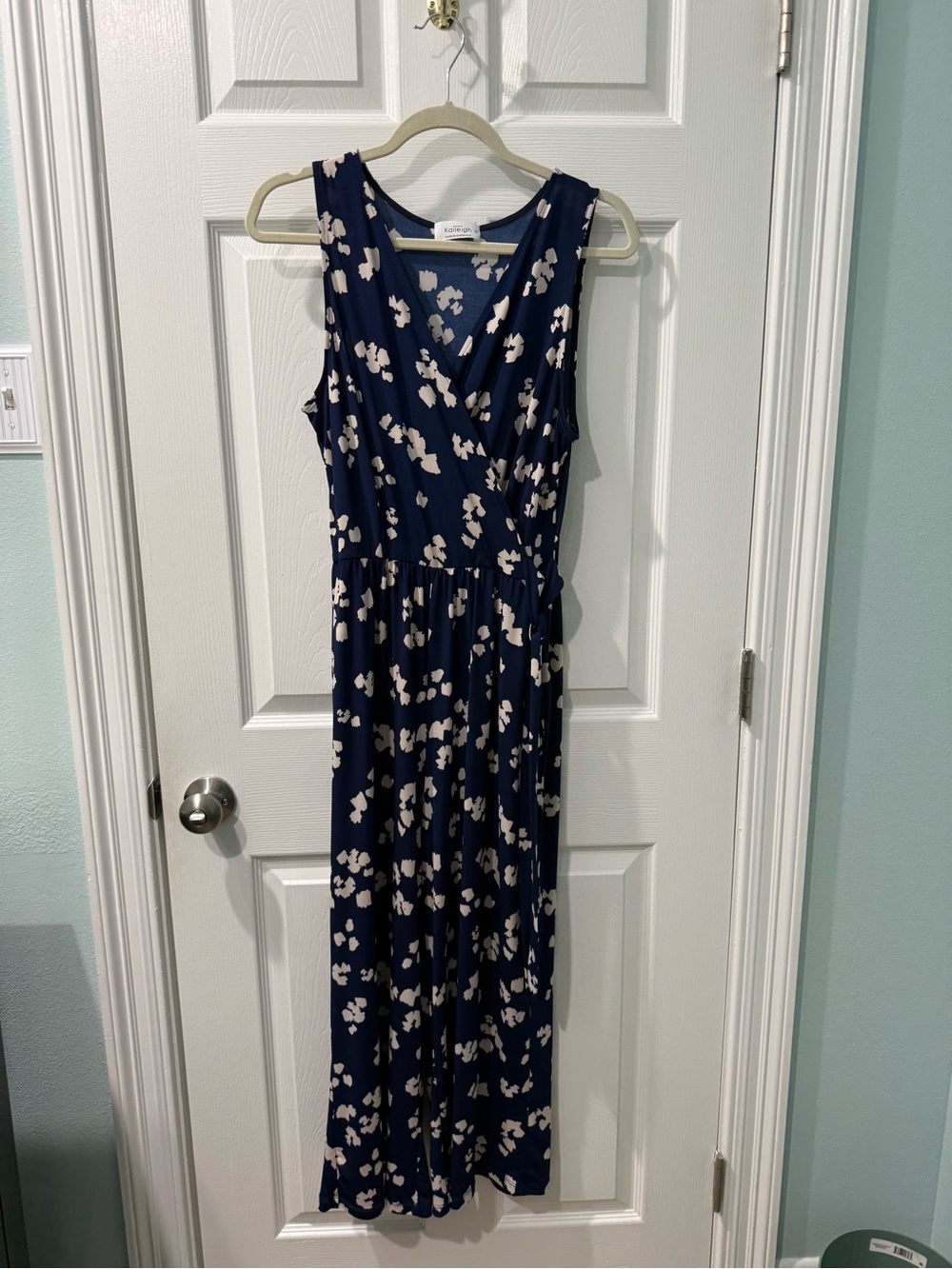 Kaileigh Navy Floral Sleeveless Wrap Jumpsuit